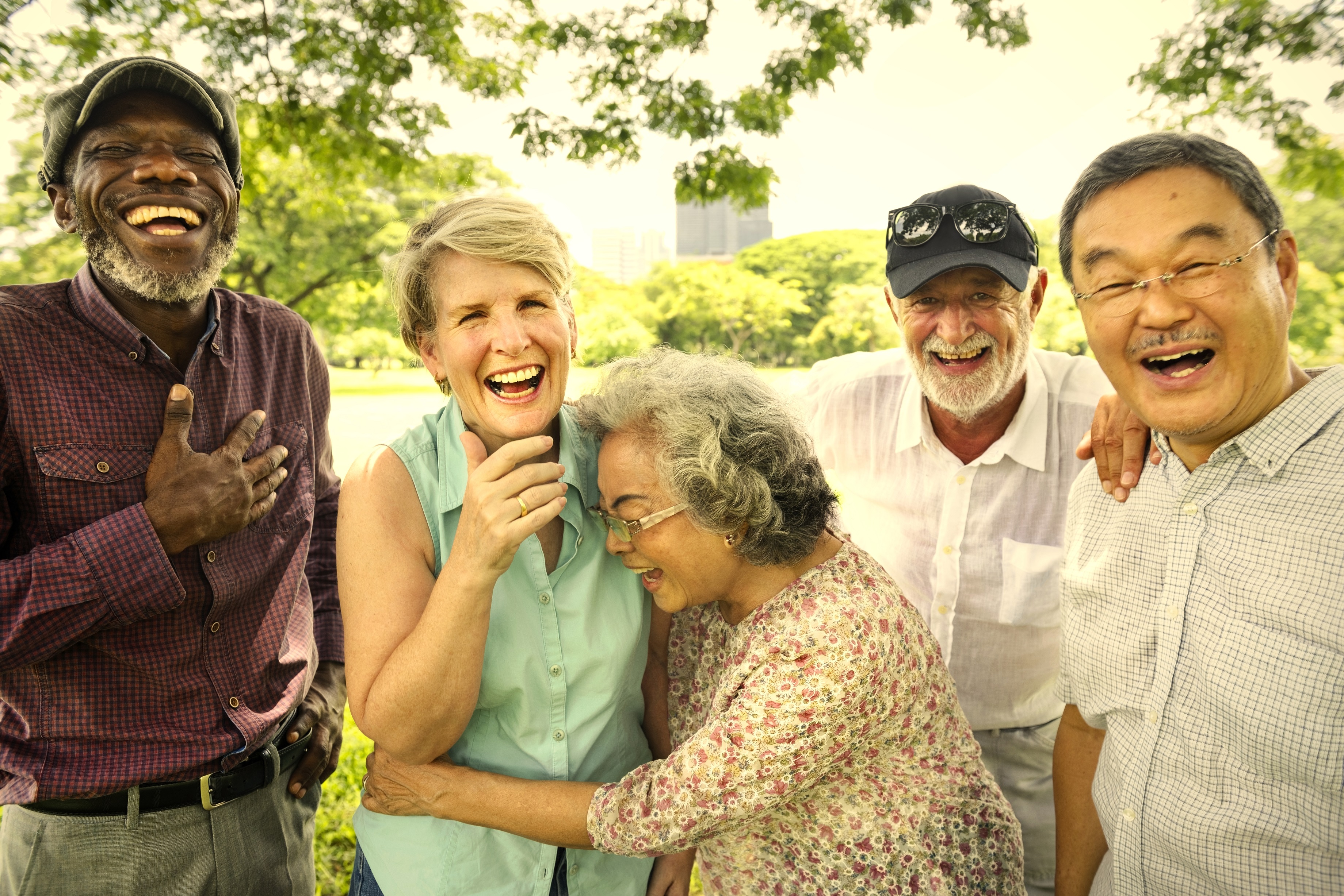 group of older adults smiling at the camera