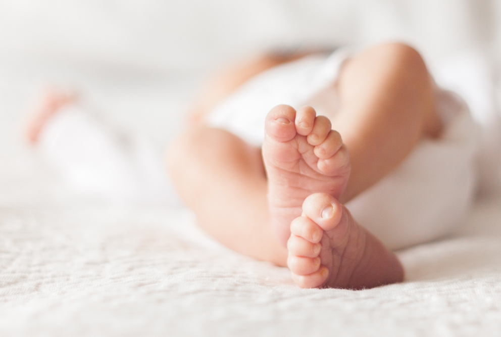 image of baby from feet to head
