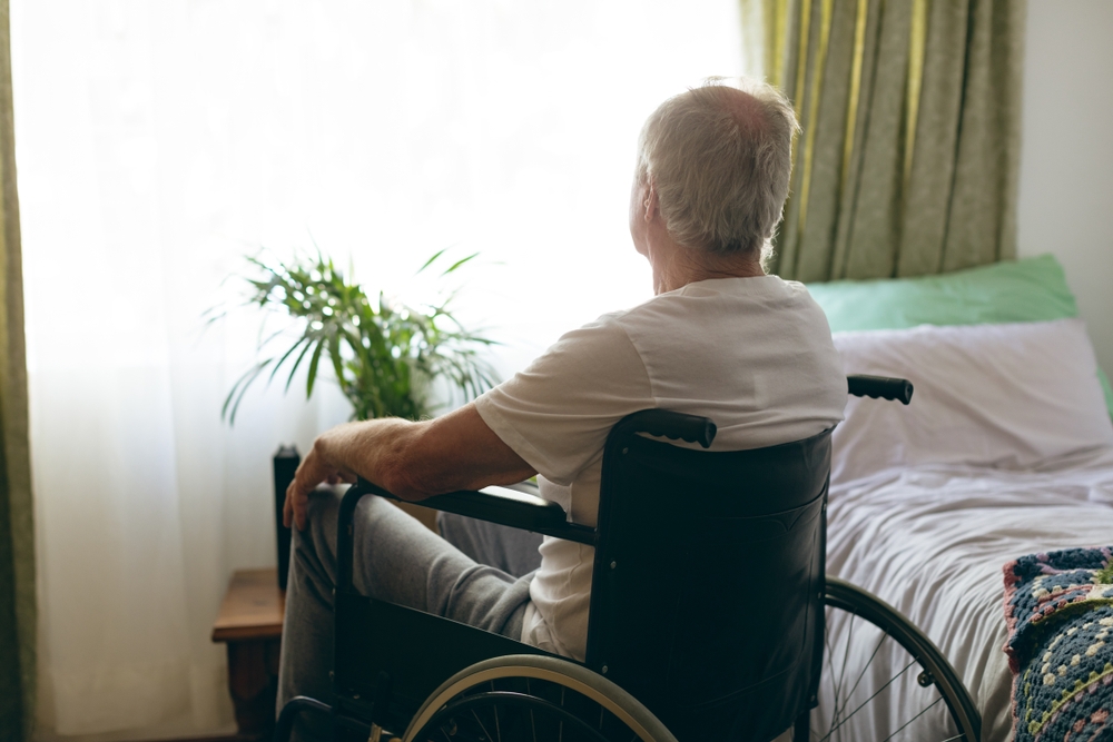 Elderly man in nursing home while in quarantine.