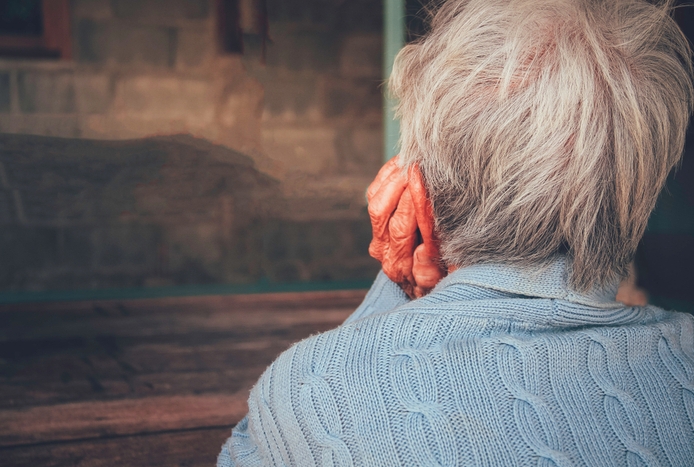 an elderly woman with gray hair