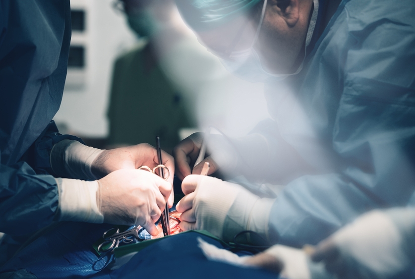 image of doctors performing surgery