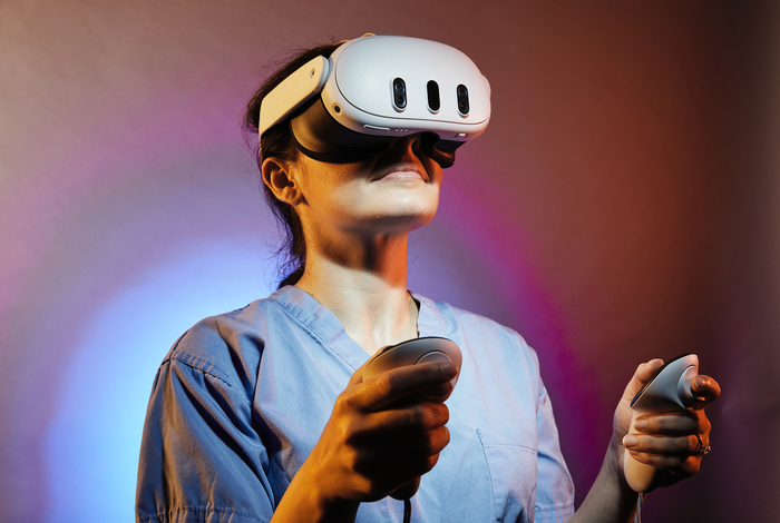 student with virtual reality tools