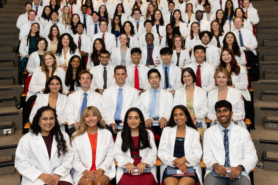 students at white coat ceremony