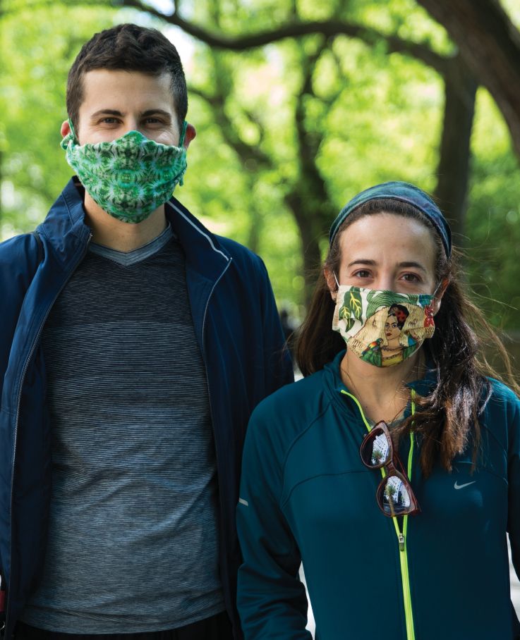 a man and woman posing with my mask