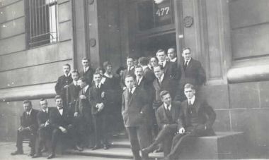 Men standing outside Cornell University in 1918