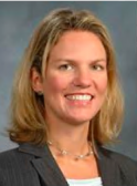 a woman posing for a headshot photo