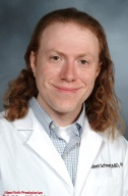 A man smiling for a photo