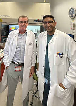 two men in lab coats