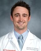 Dr. Benjamin Hartley a man posing for a portrait